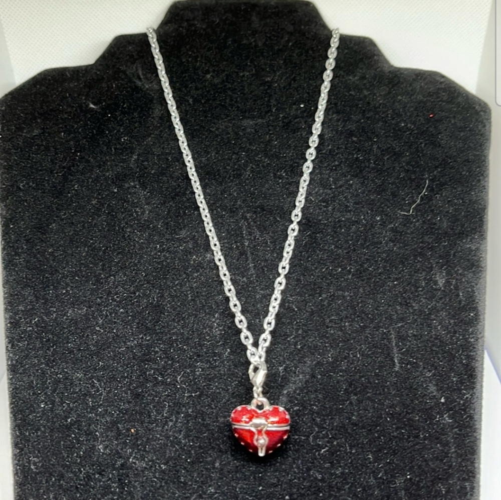 Teng Yue “Poison” Red Charm and Silver Tone Locket Necklace